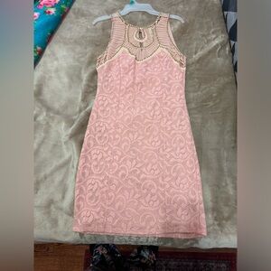 Evening mini /cocktail dress with beaded neckline